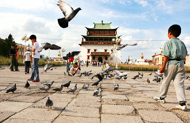 "Ulan Bator, Mongolia - August 18, 2011: The Gandantegchinlen Monastery is a Tibetan-style monastery in the Mongolian capital of Ulaanbaatar that has been restored and revitalized since 1990."